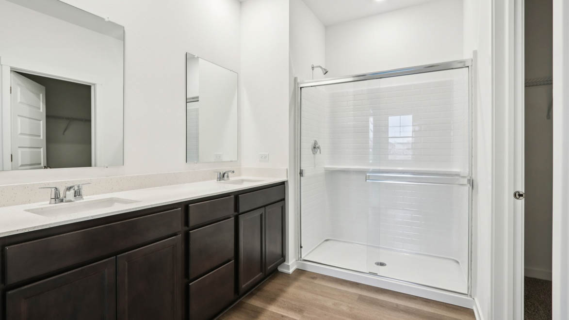 primary bathroom with dual bowl vanity