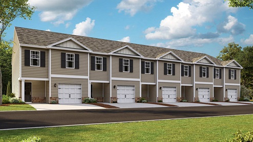 Outside of townhomes with brick and vinyl siding