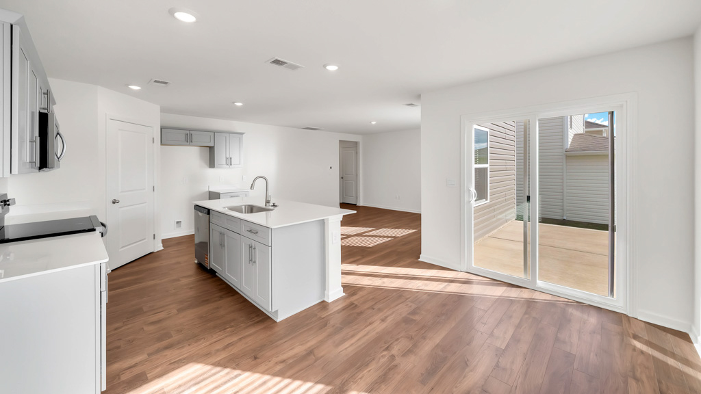 Open concept kitchen, living, and dining room space