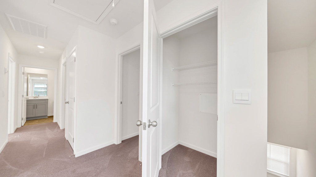 Upstairs hallway with plush carpet