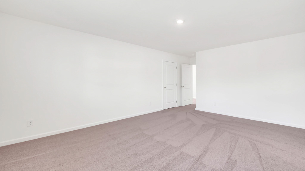 large spacious primary bedroom