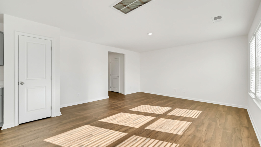 Open living and great room area with ample natural light