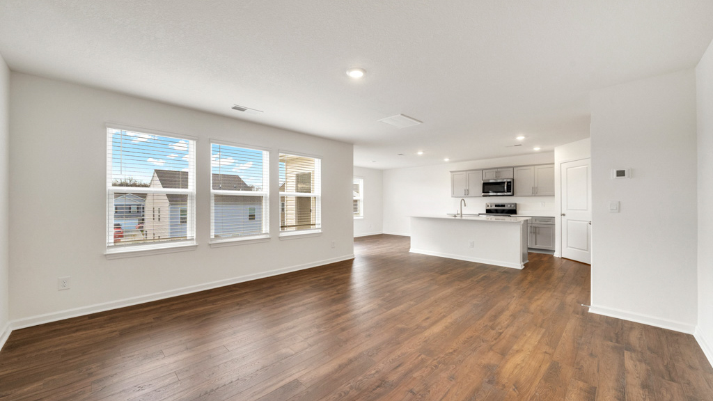 Open concept kitchen, living, and dining room space