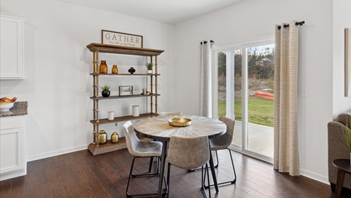 Informal dining overlooking patio space