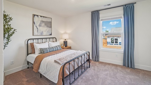 Interior bedroom with large window