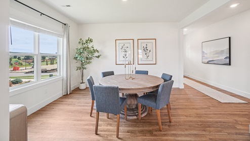 Interior dining room with two large windows