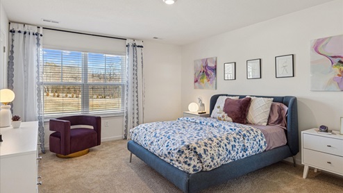 Secondary bedroom with large windows