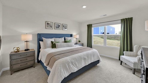 Primary bedroom with double window