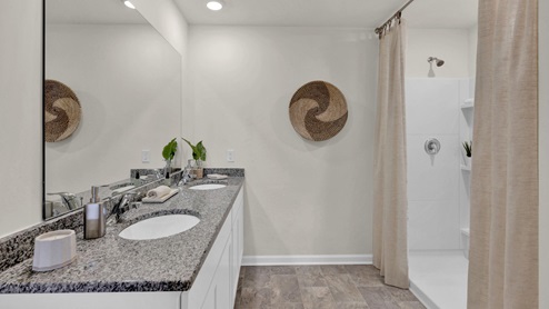 Primary bathroom with marble countertop