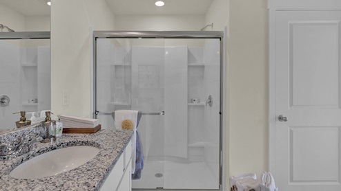 Primary bathroom with glass shower