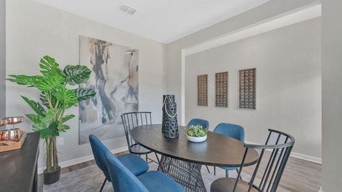 The breakfast area has enough room for a table and chairs and is perfect for family gatherings.