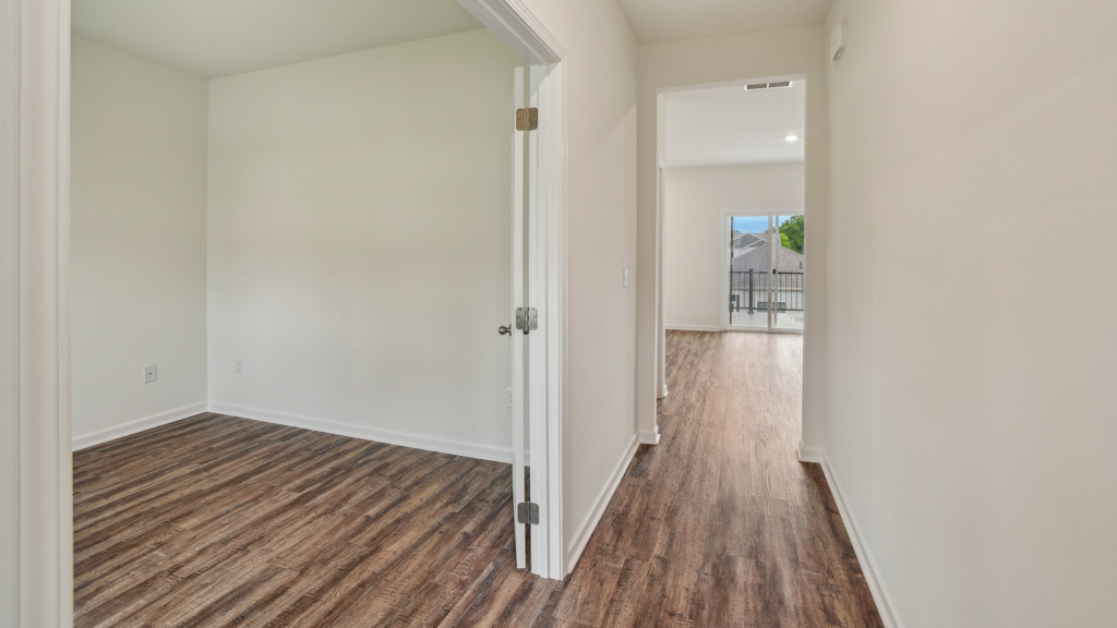 Front entryway with direct access to flex room.