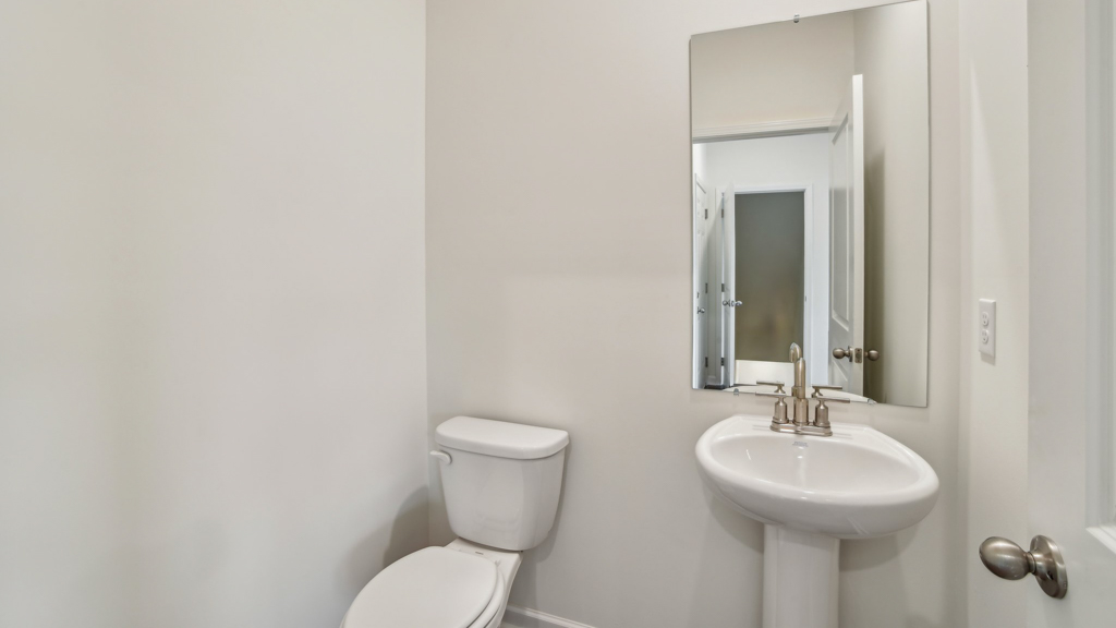 Half bathroom with single sink.