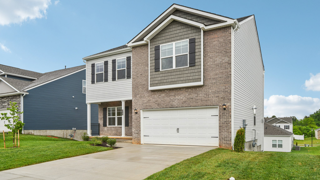 Front exterior of home with covered front porch.