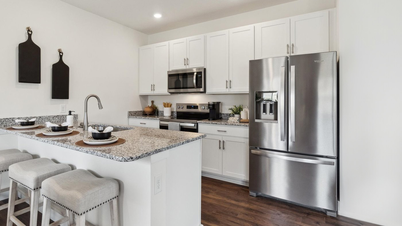 Spacious Kitchen in this new home with sink, dining areas, daily prep zones, for entertaining and daily life