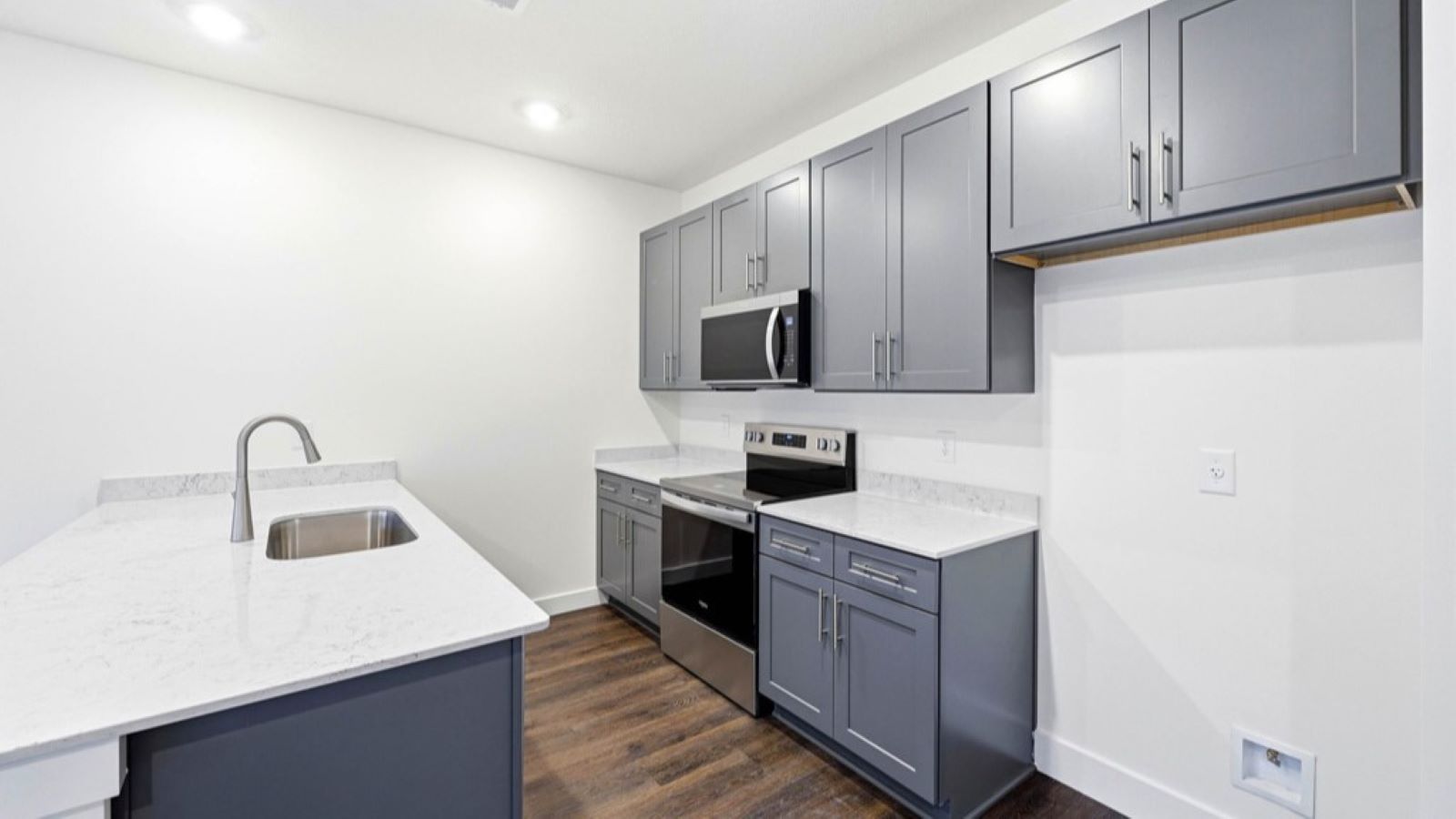 kitchen with stainless steel appliances and quartz counters