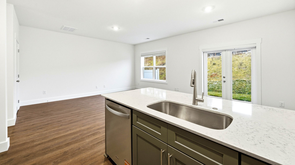 kitchen with stainless steel appliances and quartz counters