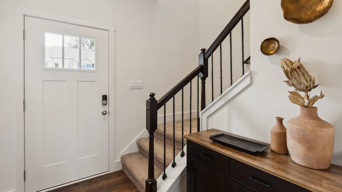 Stair access upstairs at the front door allows access to loft space, bedrooms and guest-family bathroom The Arbor