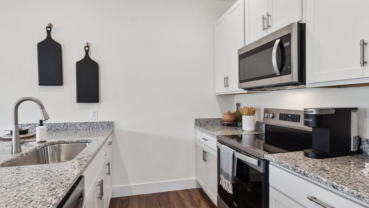 New appliances included, with our kitchen island, a sink, seating that anchor our kitchen, pantry, near dining, living rooms