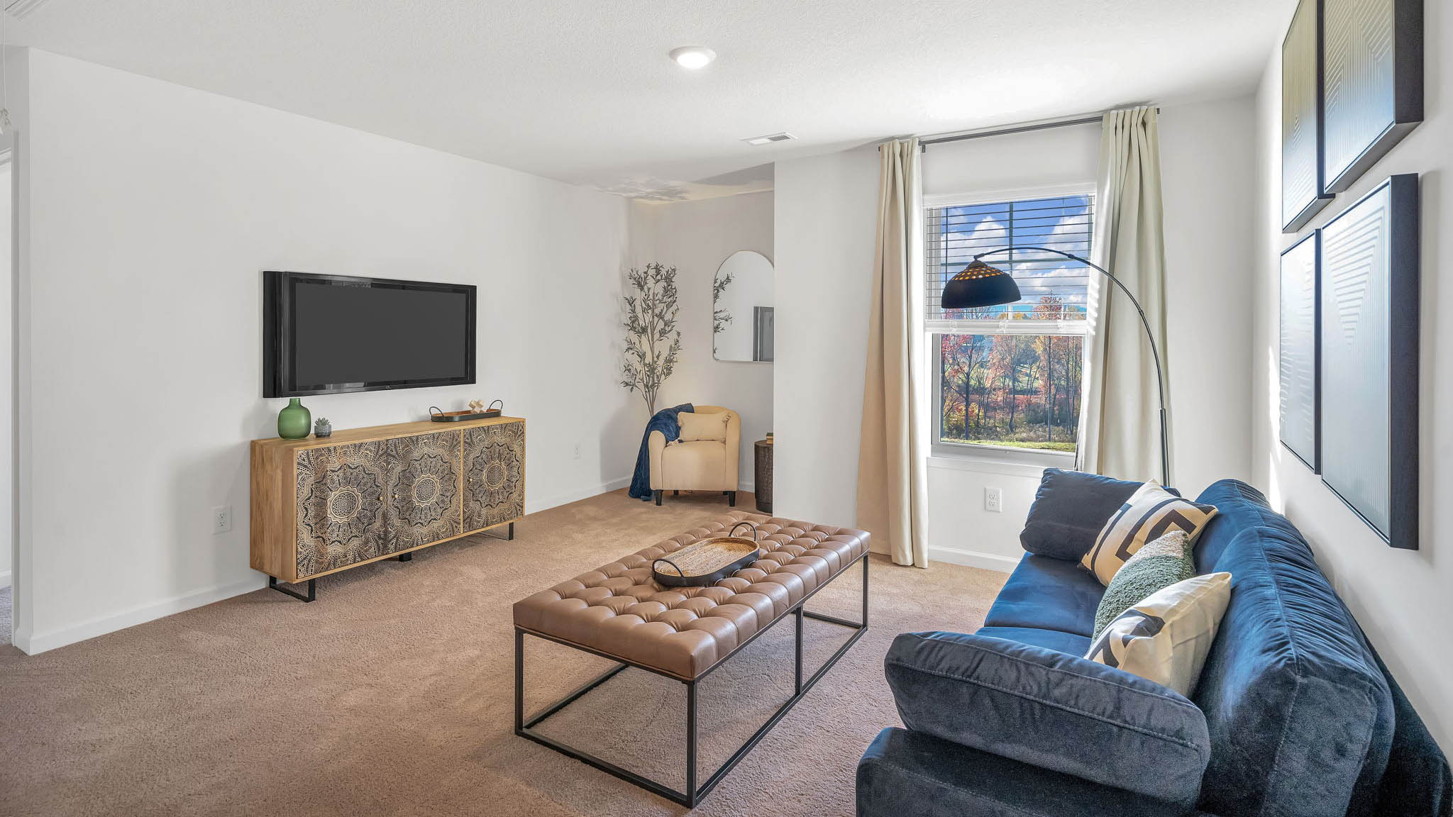 The flex space upstairs has room for a couch and television