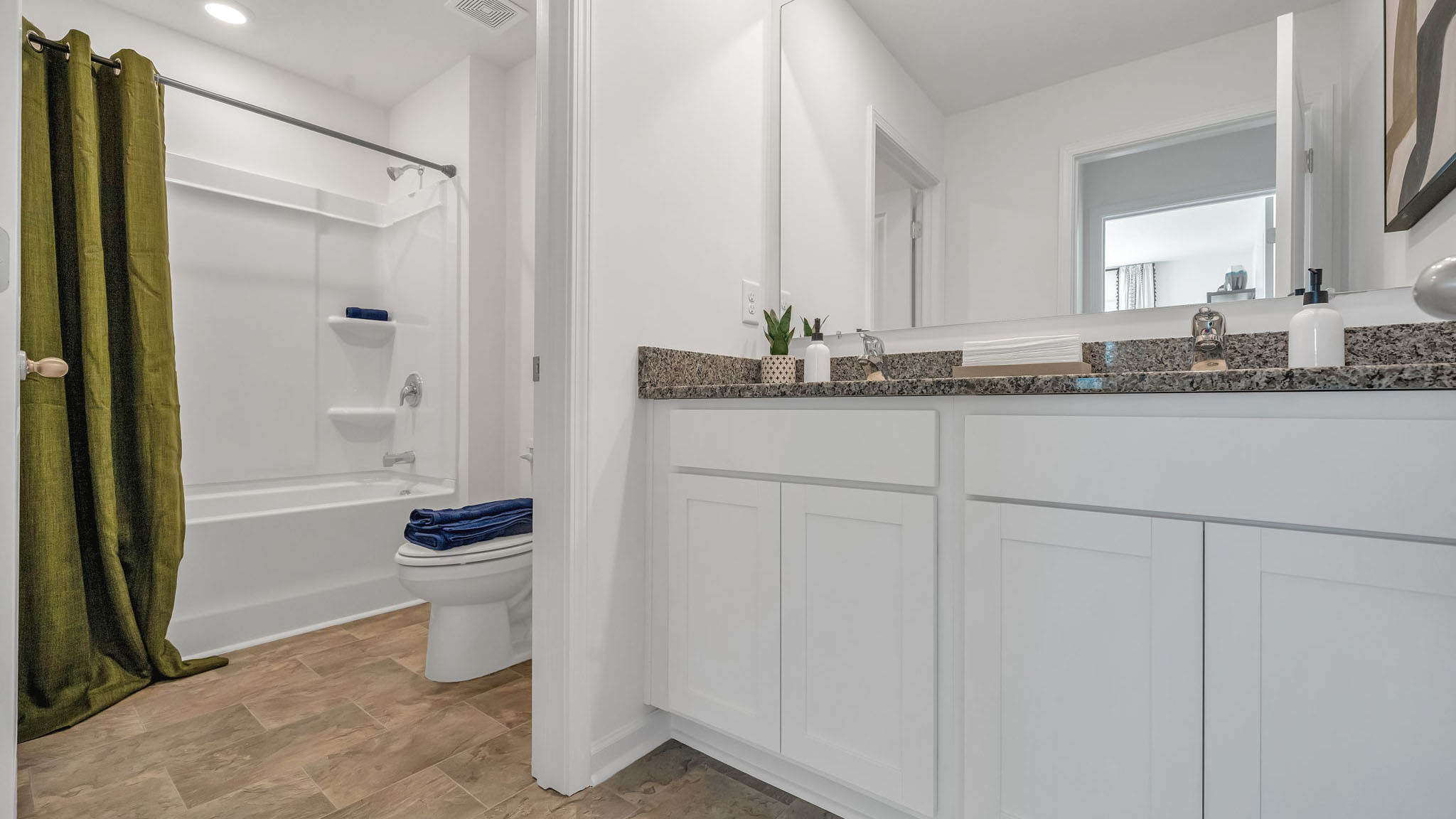 The upstairs bathroom has a large vanity