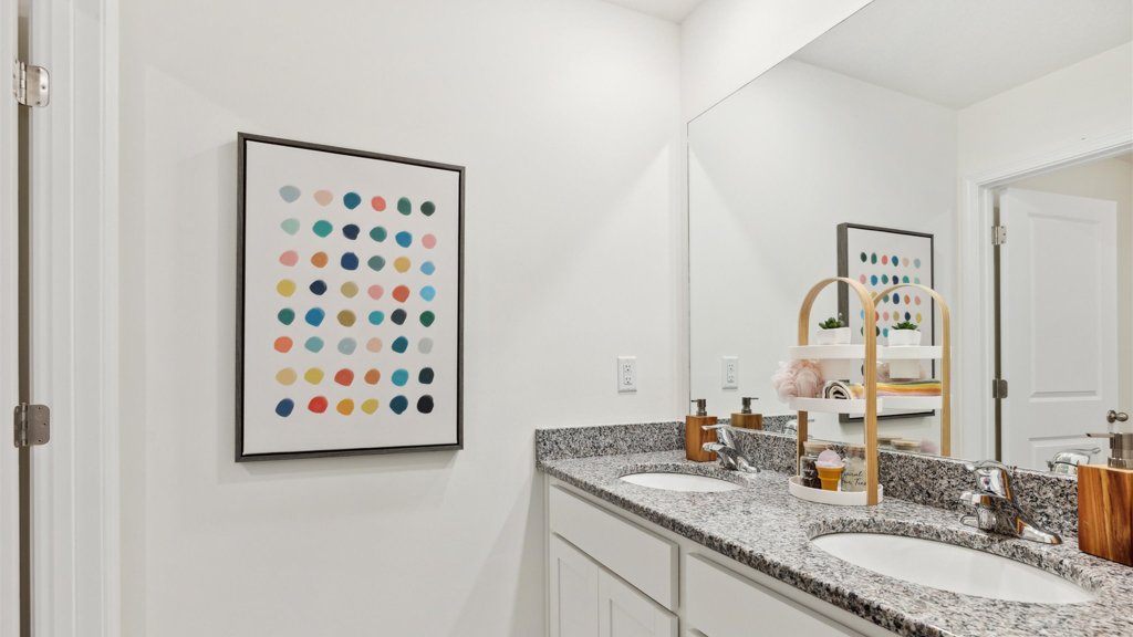 The vanity has two sinks.