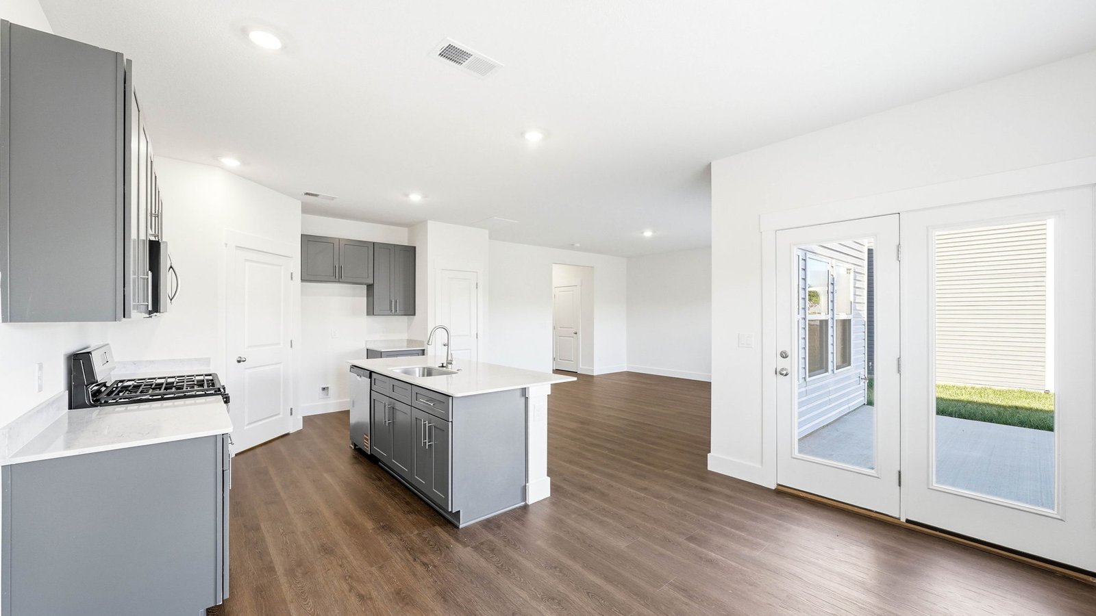 Kitchen with island and exterior door