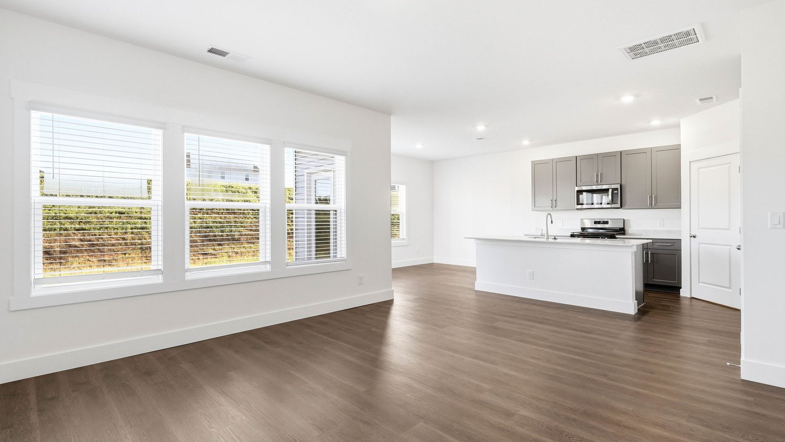 Living area opens into kitchen