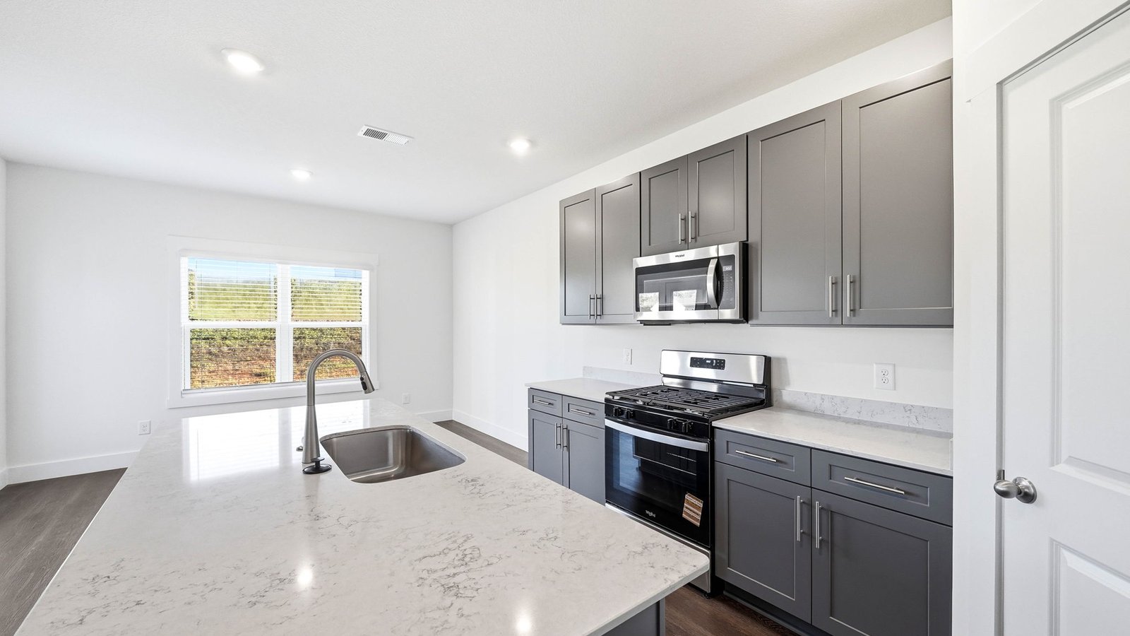 Kitchen with island and cabinets