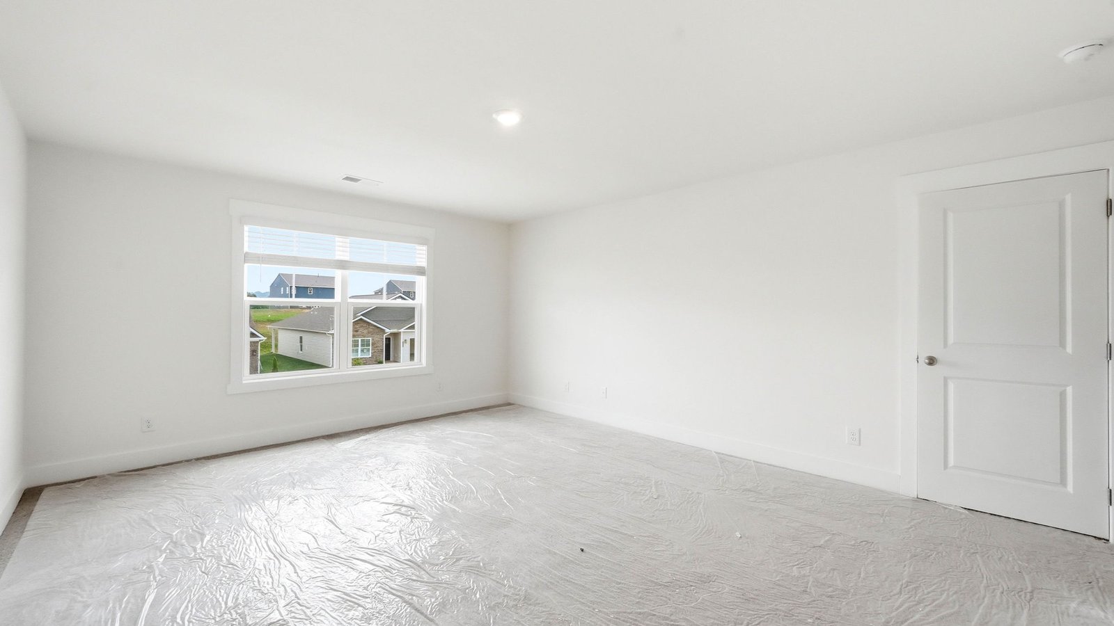 Bedroom with large window