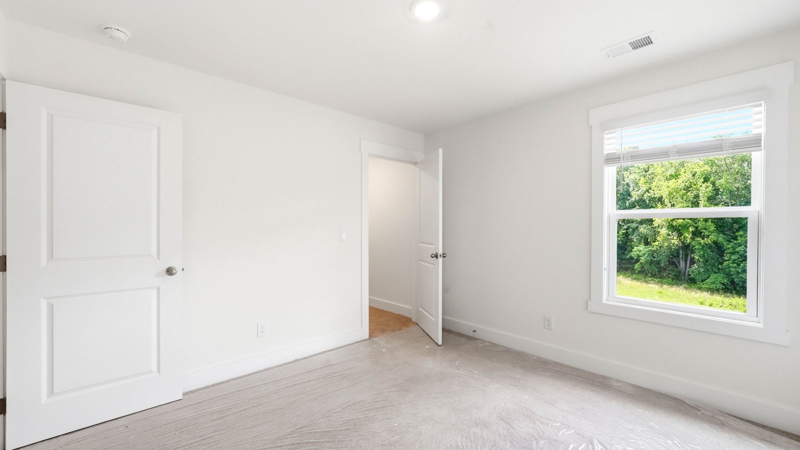 Bedroom with large window