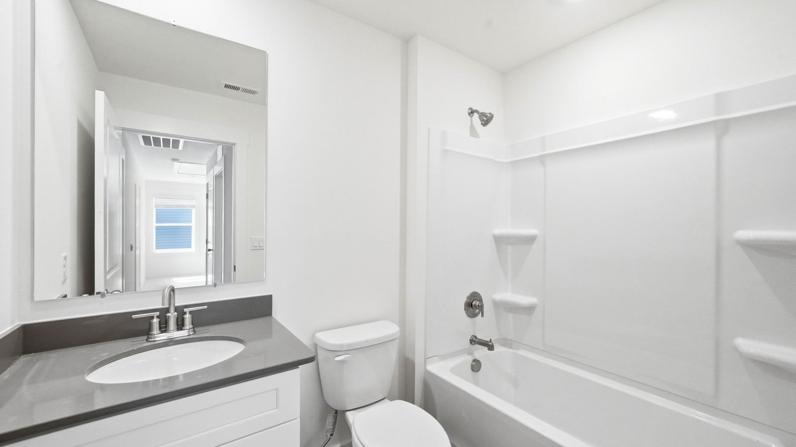 Bathroom with tub and shower combination