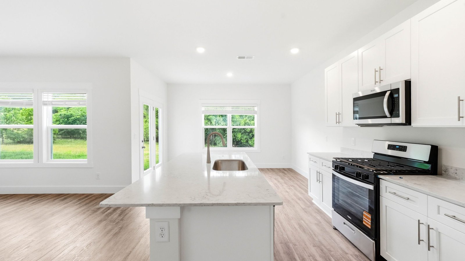Kitchen with appliances and island