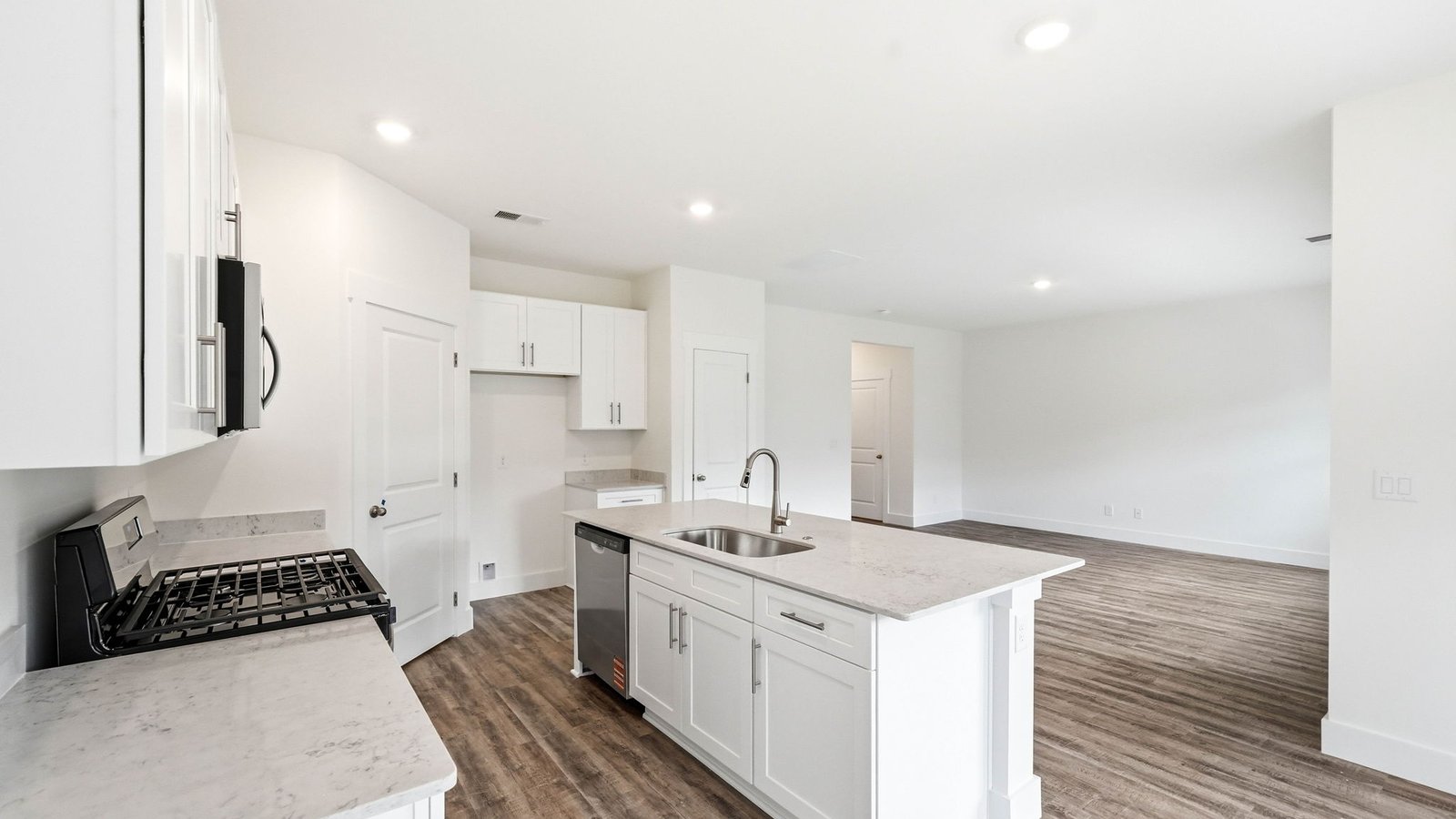 Open kitchen with island and appliances