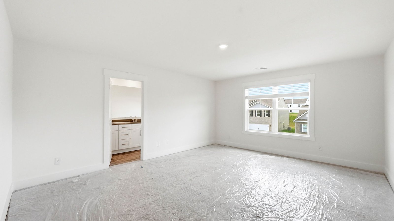 Bedroom with large window