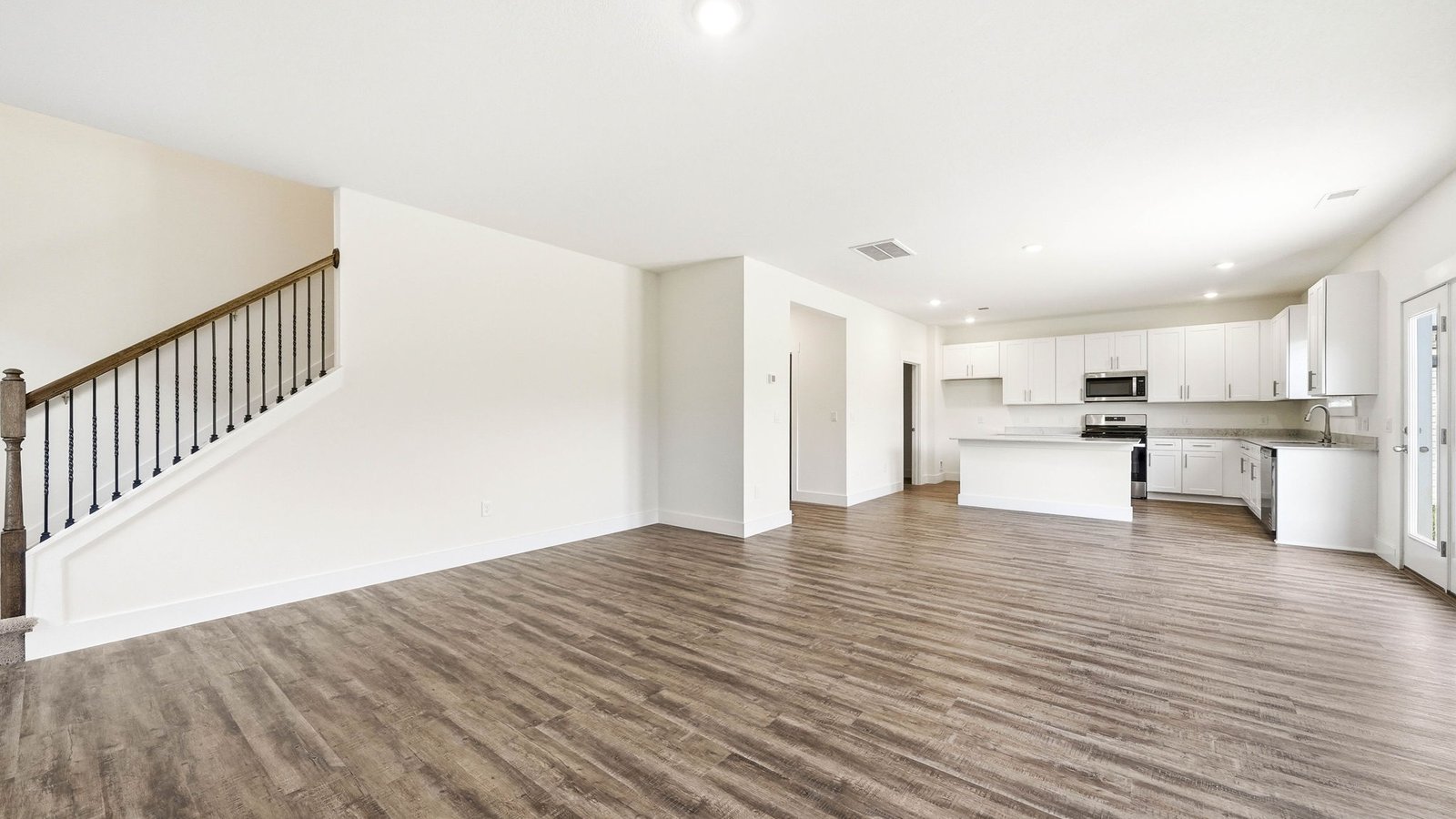 Living areas open into kitchen