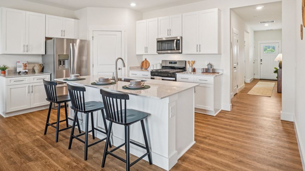 Central kitchen island with sink, seating, crafted to anchor the home, pantry, prep zones, perfect for entertaining and everyday gathering