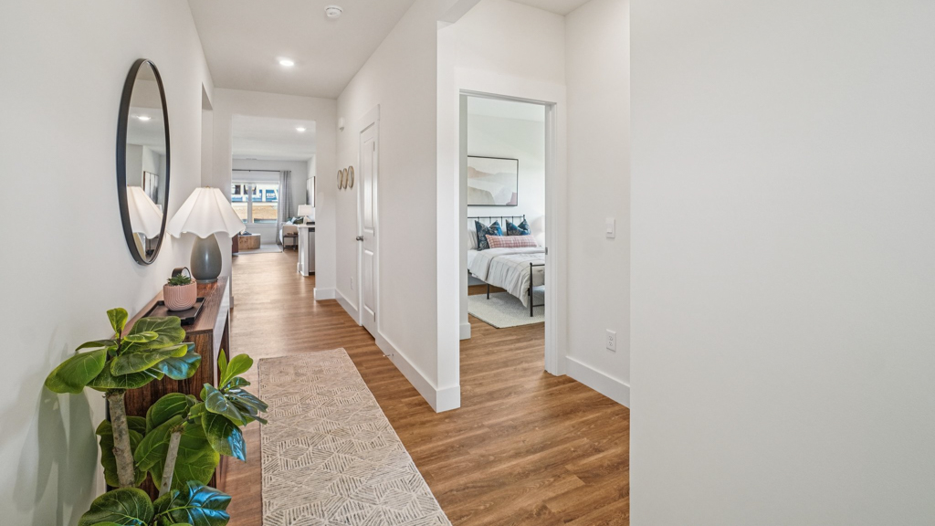 A foyer, entry hall inside front door, next to office, or sitting room adding a welcoming front, direct line of sight to home