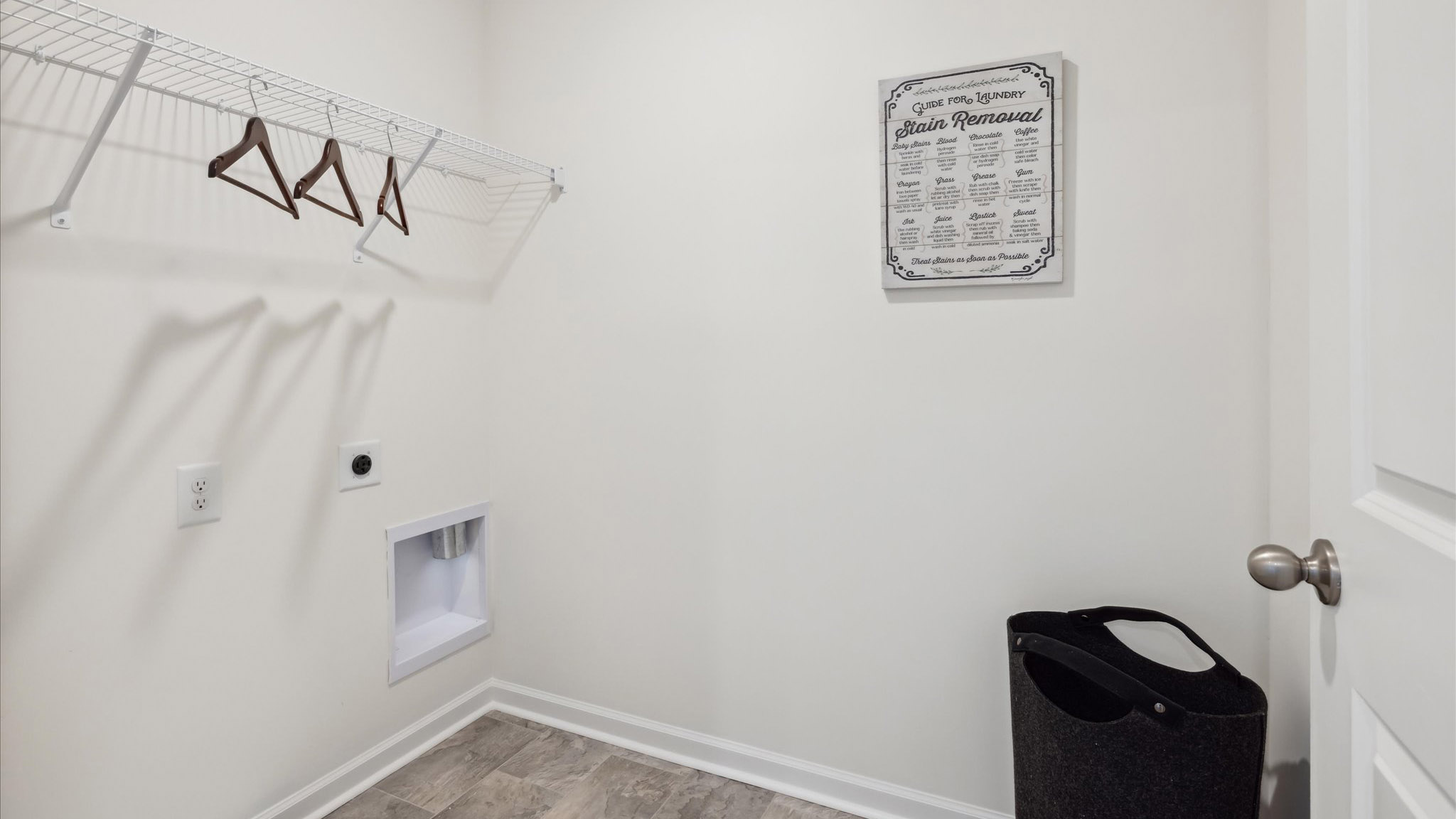 Saint Andrews Garth utility laundry smartly designed with overhead organized storage, a drop zone, with new washer, dryer included