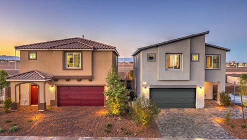 Exteriors in the Spectrum Falls community featuring designer selected paint schemes, front yard landscaping, paver walkways, and two-car garages.