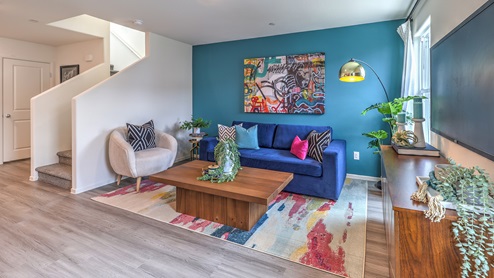 The Spectrum Trails 1410 Plan open concept Great Room with LVP panel flooring