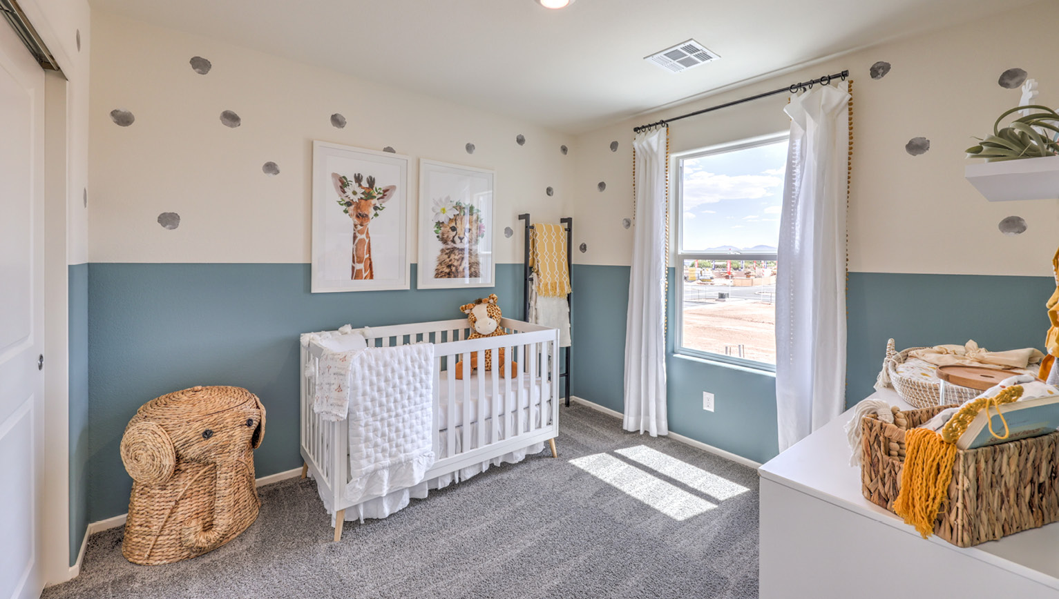 Bedroom Three in our Tempo Trails 1410 model with carpet flooring, an accent wall, sliding closet, and one window.