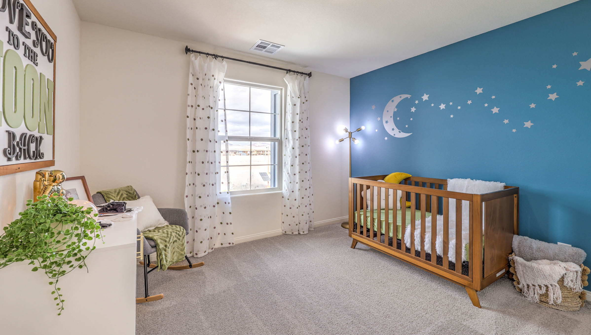 Bedroom Four in our Symmetry Bay 1802 model with carpet flooring, a sliding closet, and one window.