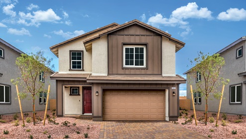 Our 2436 model home in the Symmetry Falls community with tan and light brown exterior paint, a flat tile roof, 2-car garage, front yard landscaping, and paver driveway and walkways.