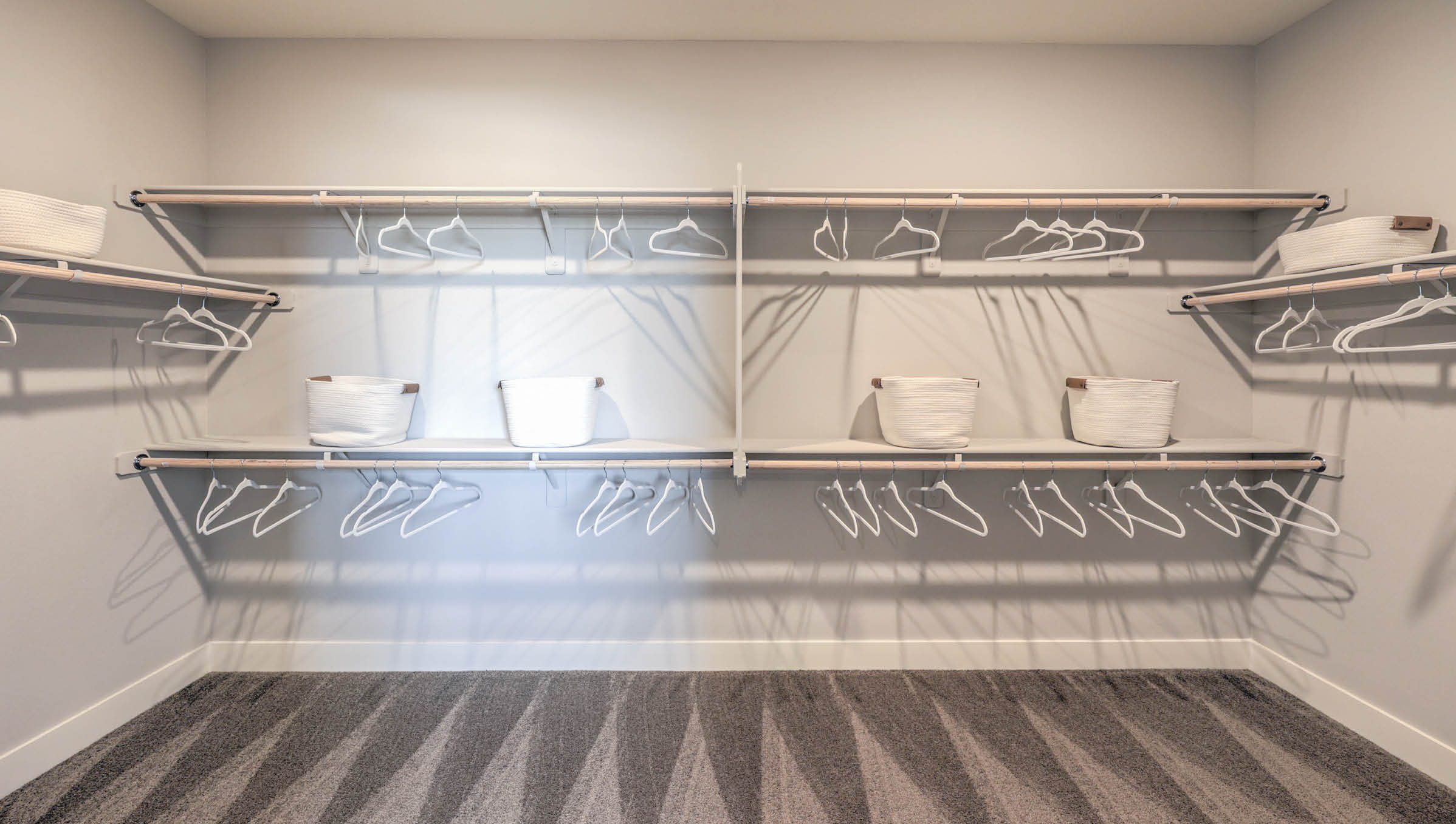 The spacious walk-in closet in our 3765 model Bedroom One Suite.