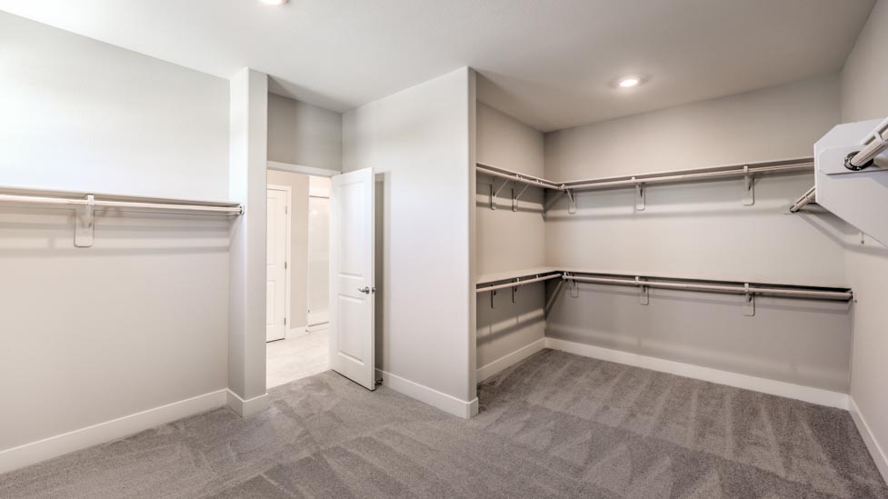 The spacious walk-in closet in our 3825 model Bedroom One Suite.