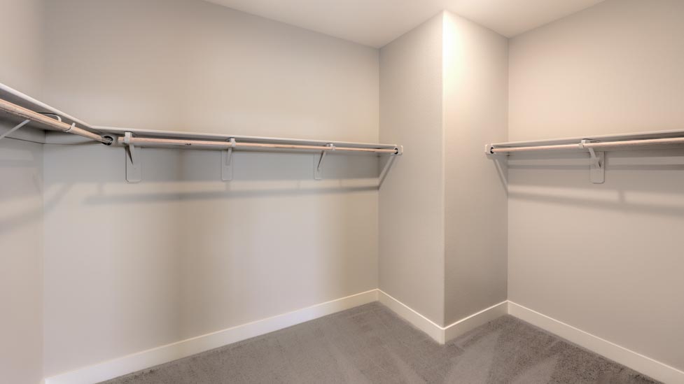 The spacious walk-in closet in Bedroom 5