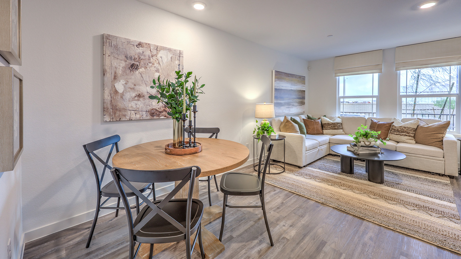 The Alpine Trails  1309 model Dining Room adjacent to the kitchen with a table and window.
