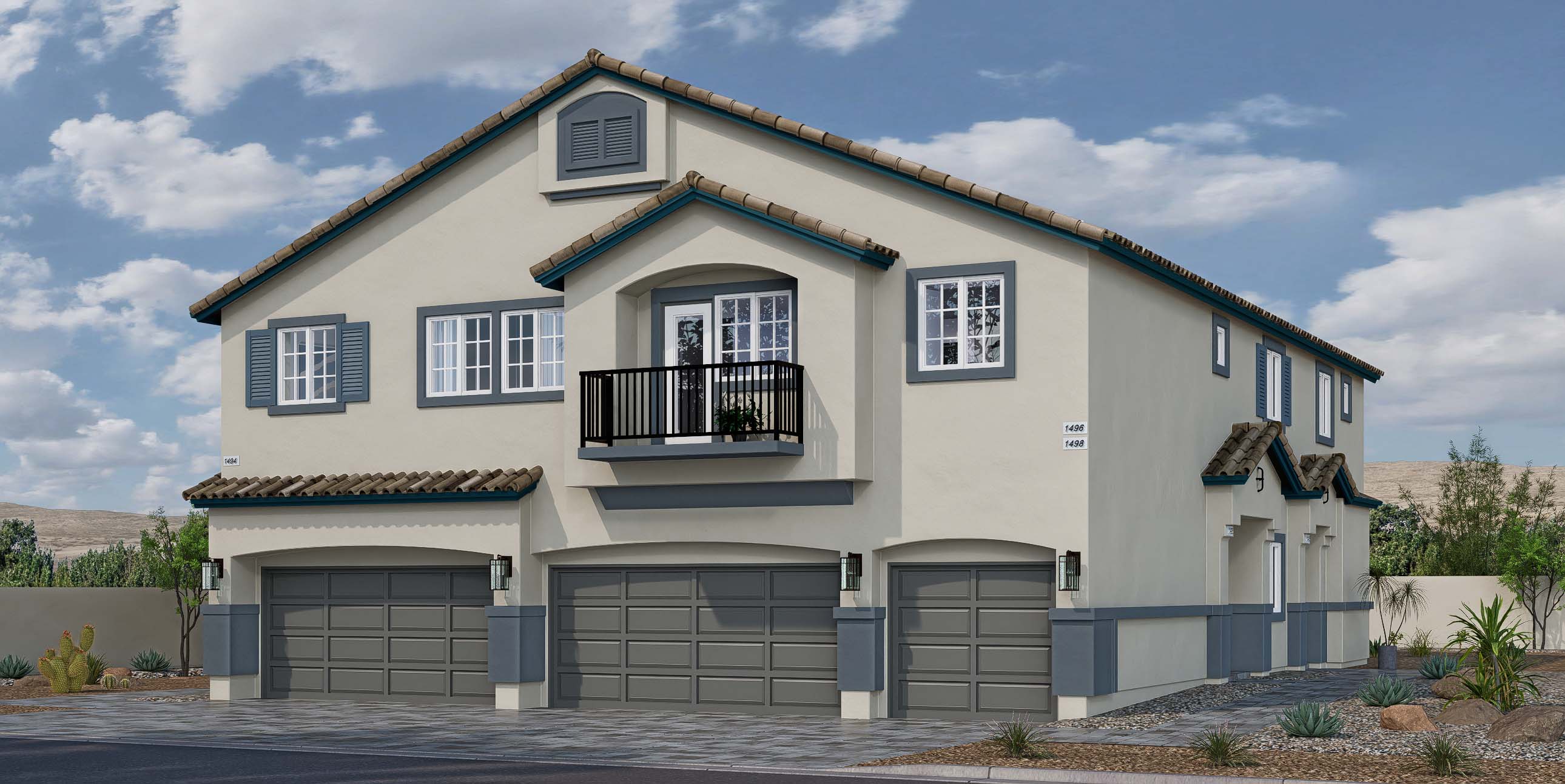 Our 1349 model home in the Juno Pointe community with blue and grey exterior paint schemes, a flat tile roof, common area landscaping, paver walkways, and a 2-car garage.