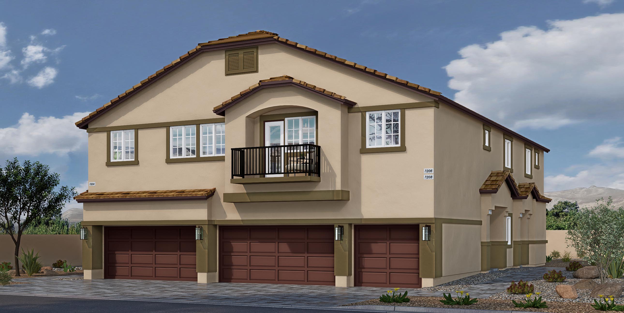 Our 1349 model home in the Juno Pointe community with tan and red exterior paint schemes, a flat tile roof, common area landscaping, paver walkways, and a 2-car garage.